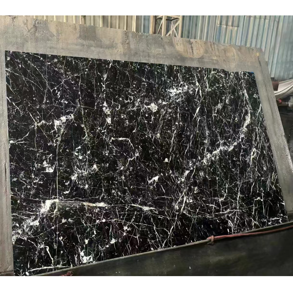 Italy Black Net marble slab photos for black net vein direction, living room wall backgrounds, floor tile layout, kitchen countertop cut-outs and export packing.
