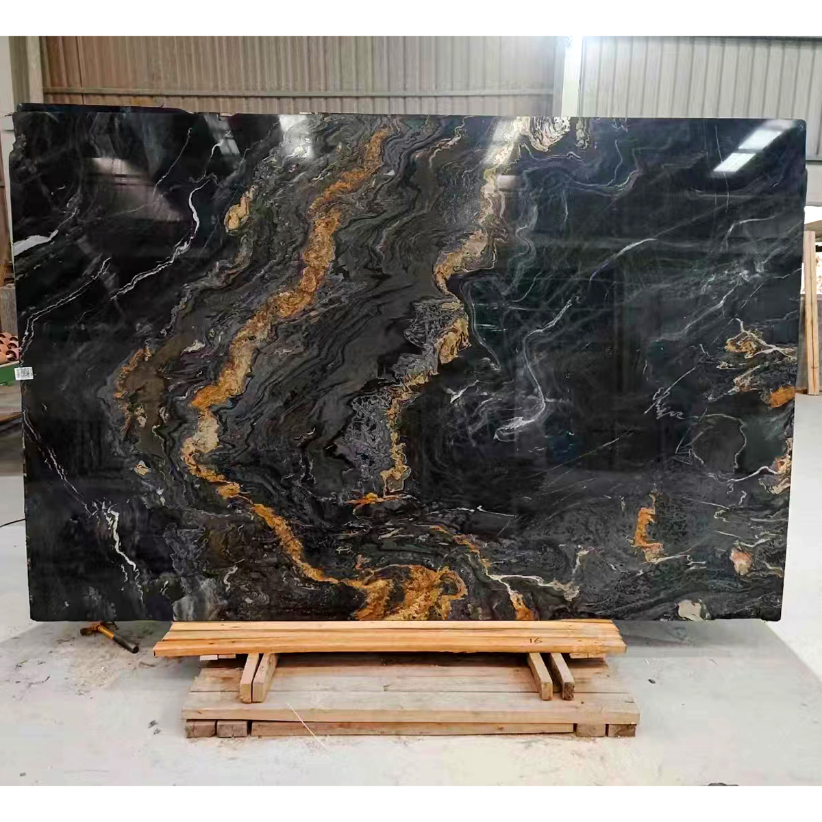 Italy Black Gold marble slab photos for black-gold tone approval, gold vein direction, kitchen countertops, home furniture, floor tile layout, hotel lobby dry lay and export packing.